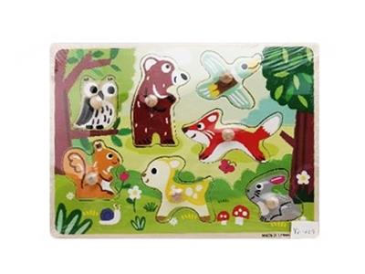 Hand grasping the wooden animal puzzles - OBL806218