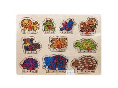 Hand grasping the wooden animal puzzles - OBL806235