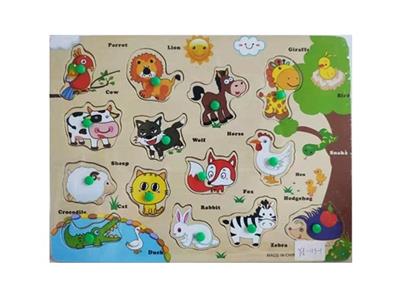 Hand grasping the wooden animal puzzles - OBL806246