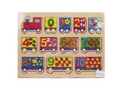 Hand grasping the wooden puzzle train - OBL806353