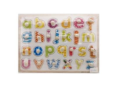 Hand grasping the wooden lowercase letter puzzles - OBL806361