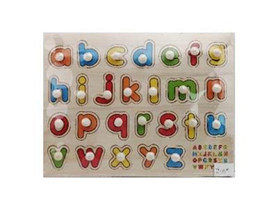 Hand grasping the wooden lowercase letter puzzles - OBL806364