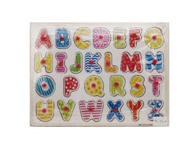 Puzzle hand grasping the wooden capital letters - OBL806369