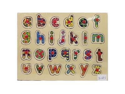 Hand grasping the wooden lowercase letter puzzles - OBL806383