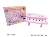 OBL643710 - Minnie lights the piano