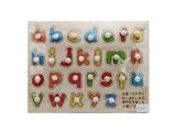 OBL806364 - Hand grasping the wooden lowercase letter puzzles